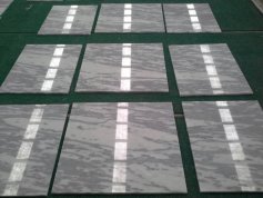 Ink wash painting style white marble tiles